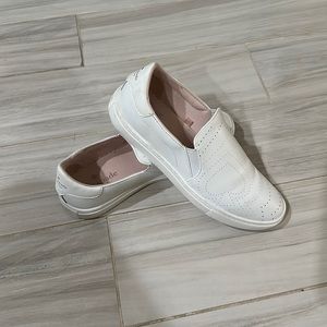 Kate Spade Azores perforated leather slip-ons.